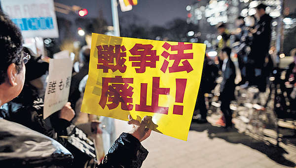 日新安保法實施 京促慎重行事