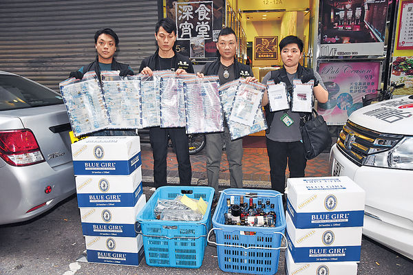 警掃無牌樓上吧 拘21人