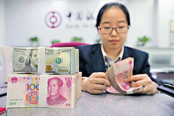 中央傳售美債及強制結滙