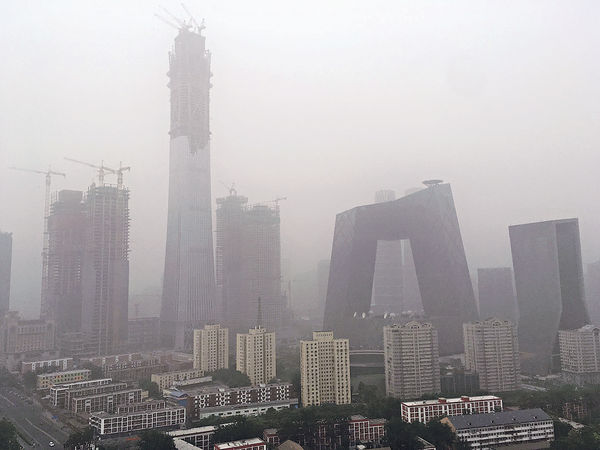 穗深暴雨阻交通 沙塵襲京污染爆燈