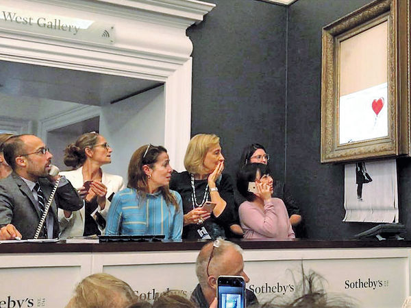 Banksy設局 「自毀」千萬畫作 控訴藝術市場炒賣潮