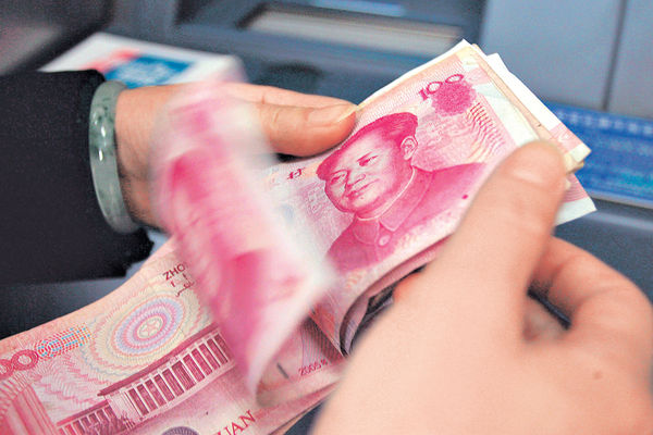 人行釋維穩訊號 在岸人幣升穿6.9