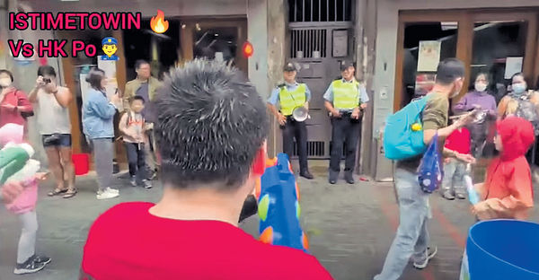 九龍城潑水節警遭射水 拘2漢涉行為不檢